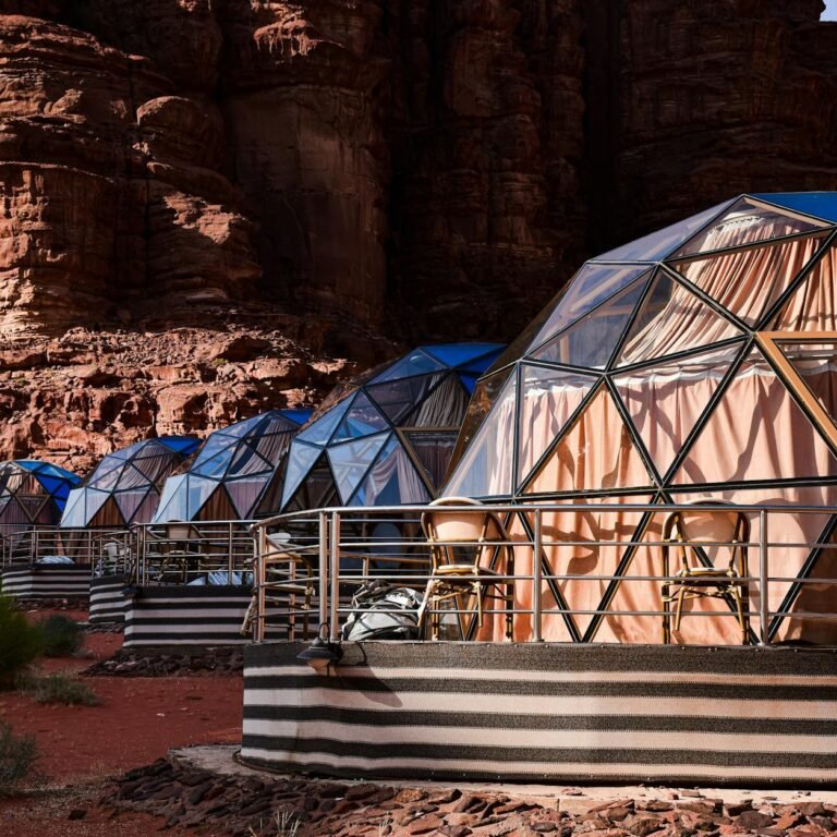 houses with glass walls on desert