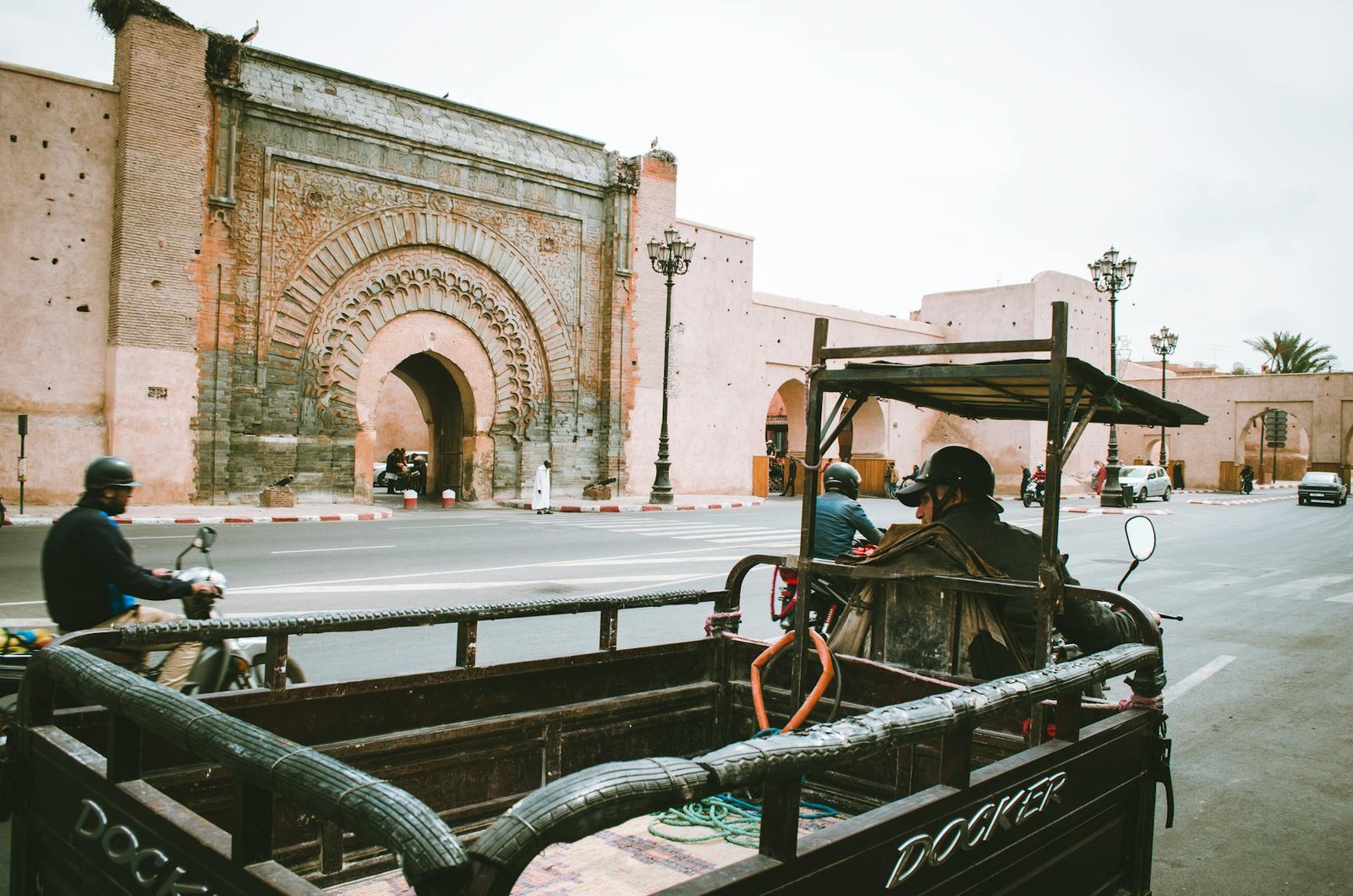 person riding auto rickshaw in Imperial cities of Morocco tour